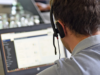 Ein Mann mit Headset sitzt arbeitet am MARGA Planspiel