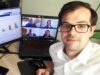 Ein Teilnehmer sitzt an seinem Schreibtisch und arbeitet mit seinen Teamitgliedern online am Planspiel